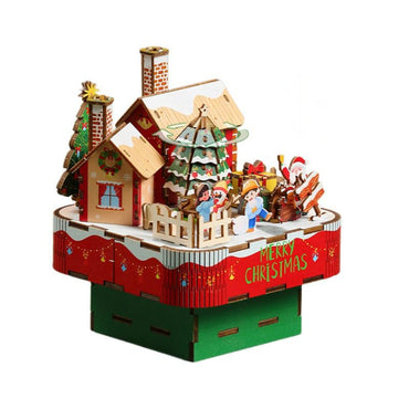Die fertig montierte Holzmusikbox, die als bezaubernde Weihnachtsdekoration in einer gemütlichen Wohnumgebung ausgestellt wird