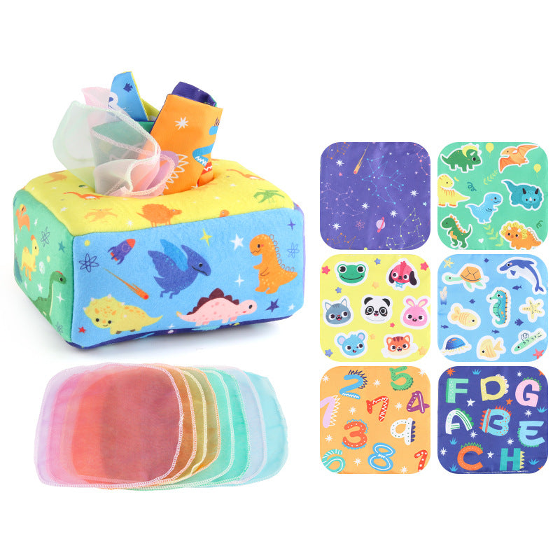 Baby spielt mit einem montessori-gemäßen sensorischen Taschentuchbox-Spielzeug und trainiert feinmotorische Fähigkeiten sowie visuelle Konzentration