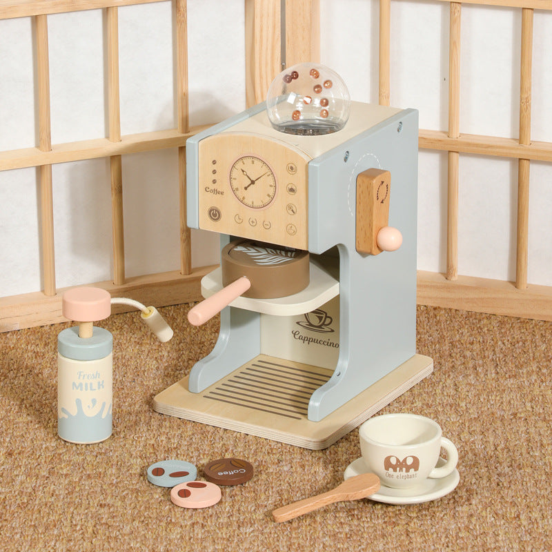 Toy espresso machine with pressable milk frother and wooden coffee pods