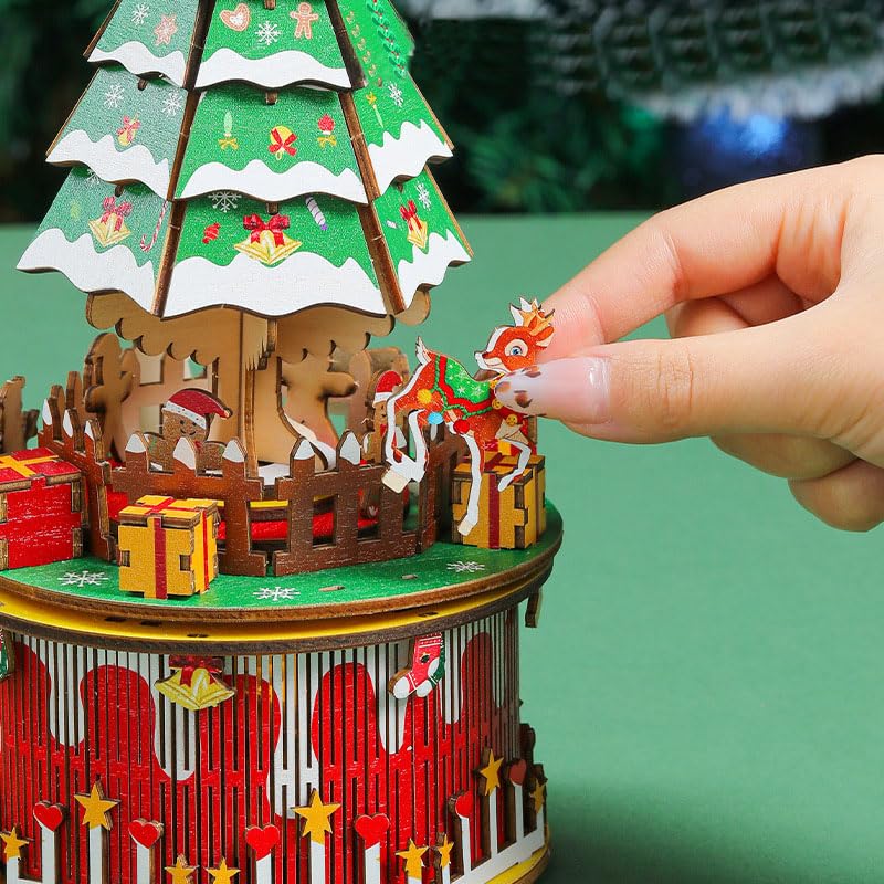 The assembled wooden music box displayed as a charming holiday decoration in a cozy home setting