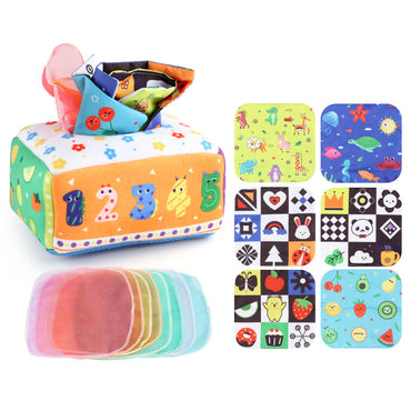 Baby spielt mit einem sensorischen Taschentuch-Box-Spielzeug nach Montessori-Prinzipien und fördert seine feinmotorischen Fähigkeiten sowie seine visuelle Konzentration