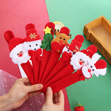 The soft flannel Christmas slap bracelet being worn on a person's wrist