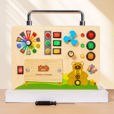 A Montessori-inspired wooden busy board for toddlers with engaging LED lights, switches, and buttons, designed for early education and sensory play.