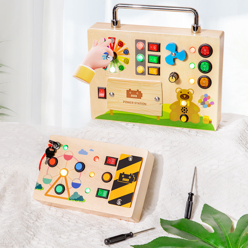 A Montessori-inspired wooden busy board for toddlers with engaging LED lights, switches, and buttons, designed for early education and sensory play.