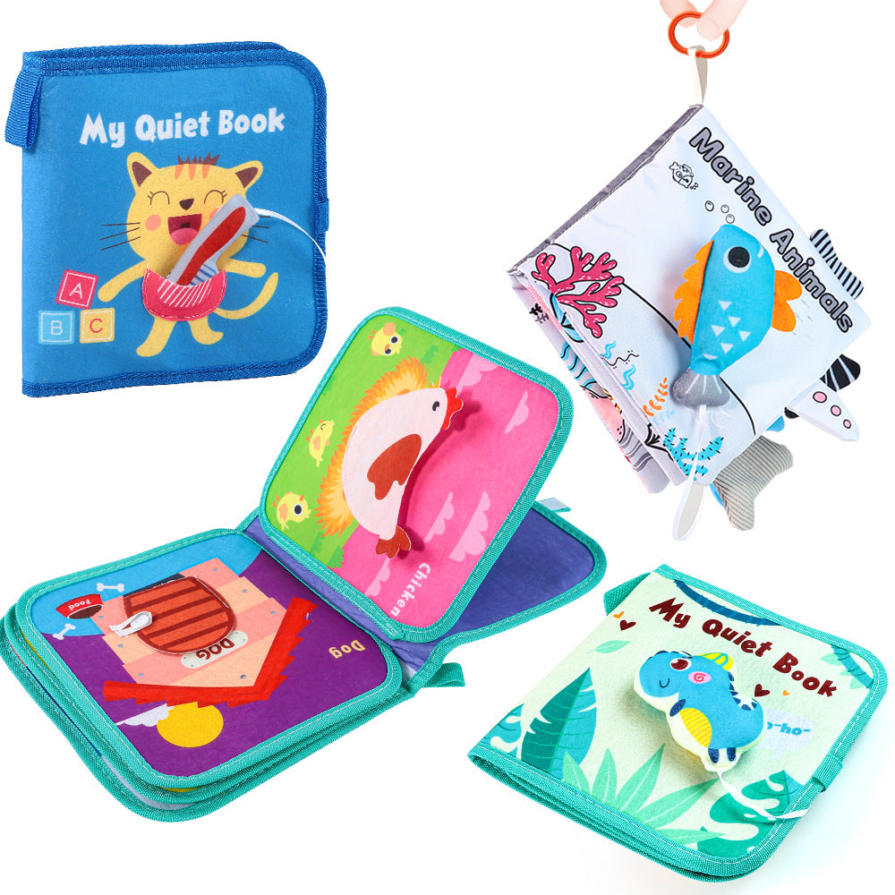 Fabric busy book clipped to stroller for on-the-go toddler play during travel or tummy time