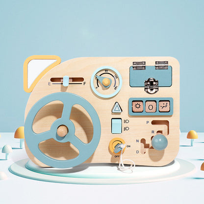 Montessori toddler busy board made of solid beechwood, featuring a steering wheel, locks with keys, switches, and gears for sensory play.